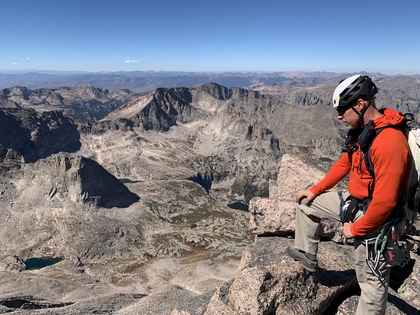 Jesse Dunlap at the summit of Longs Peak, a 14,259-foot fourteener in Colorado